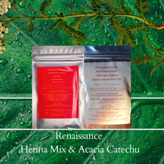 deep auburn hair dye with henna mixed with herbs and acacia catechu- image of two sealed foil packets against a green leaf and plant background