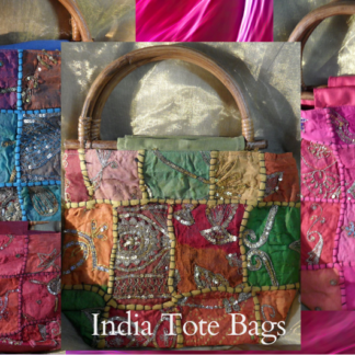 Image of four brightly coloured Indian tote bags with wooden handles made from recycled saris.