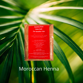 natural looking red hair colour , product image of Renaissance Henna Morocco henna against a green leafy background