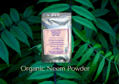neem powder product in sealed foiled packet with light pink label, displayed against a natural green leafy background