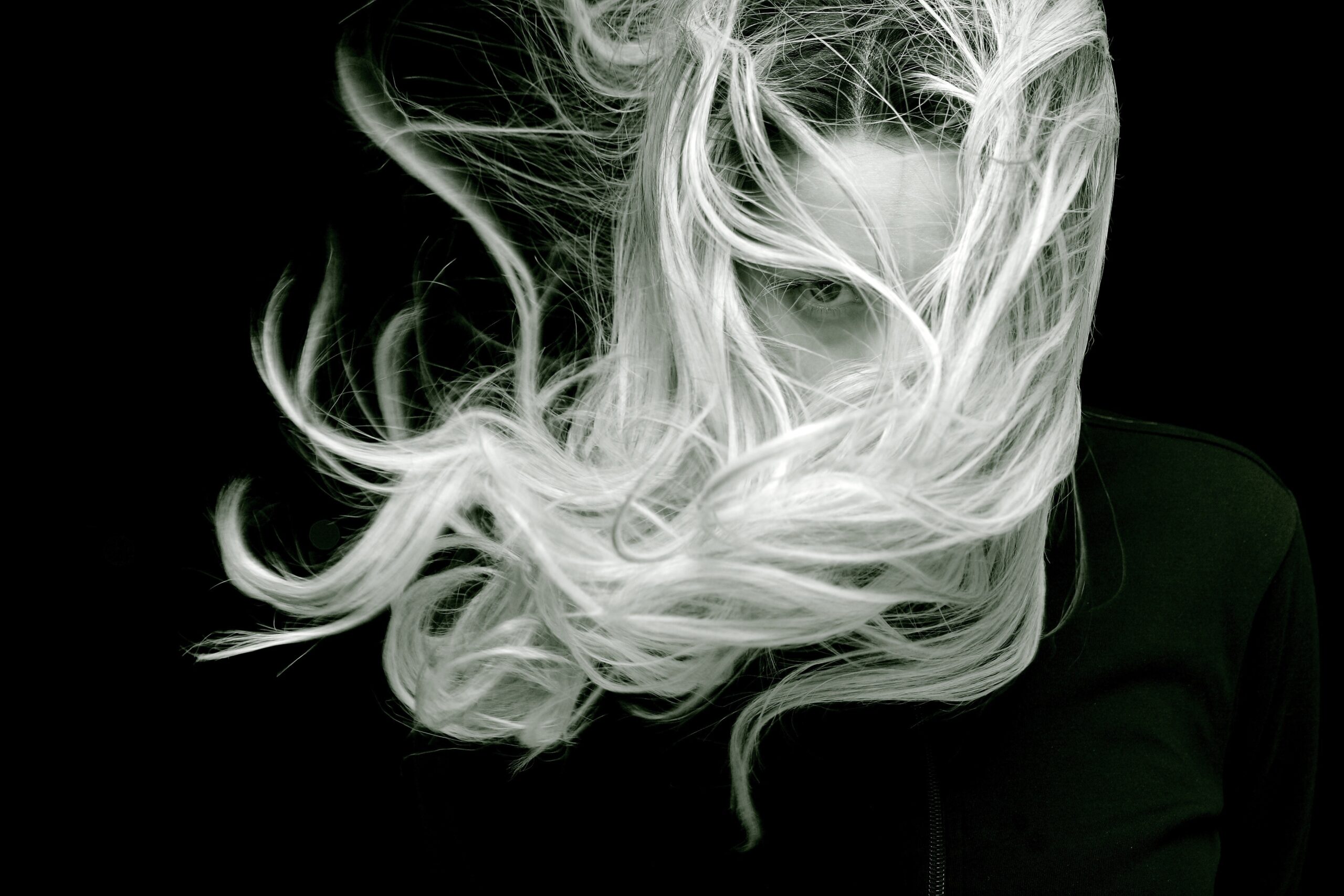 Bleaching Hair, picture of bleached white long hair in black and white