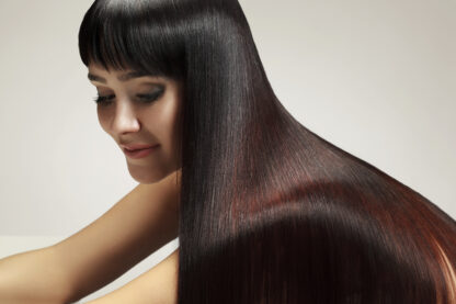 Beautiful Woman with Healthy Long Hair,natural dark brown permanent hair dye on long silky hair