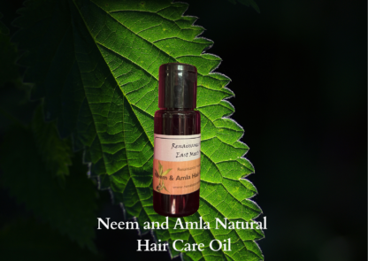 Product image of neem and amla natural hair oil against a leaf background