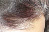 Maryam grey roots mixed with previous colour, side view